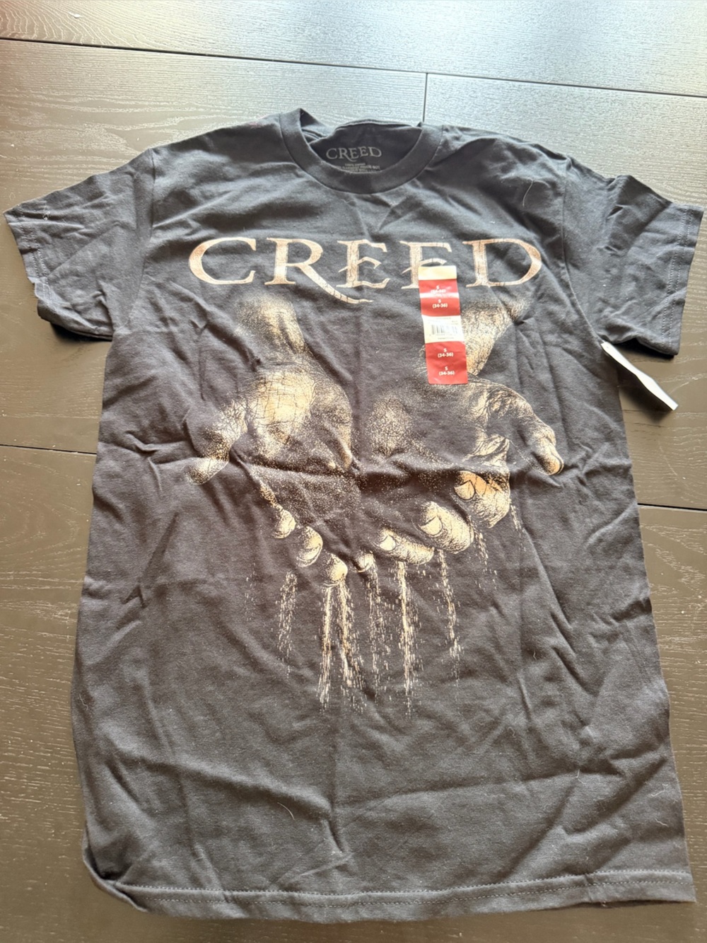 Creed Black Short Sleeve Tee with Sand-Style Hand Graphic